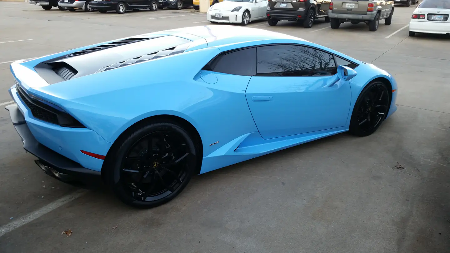 Blue Lamborghini with professionally finished window tint
