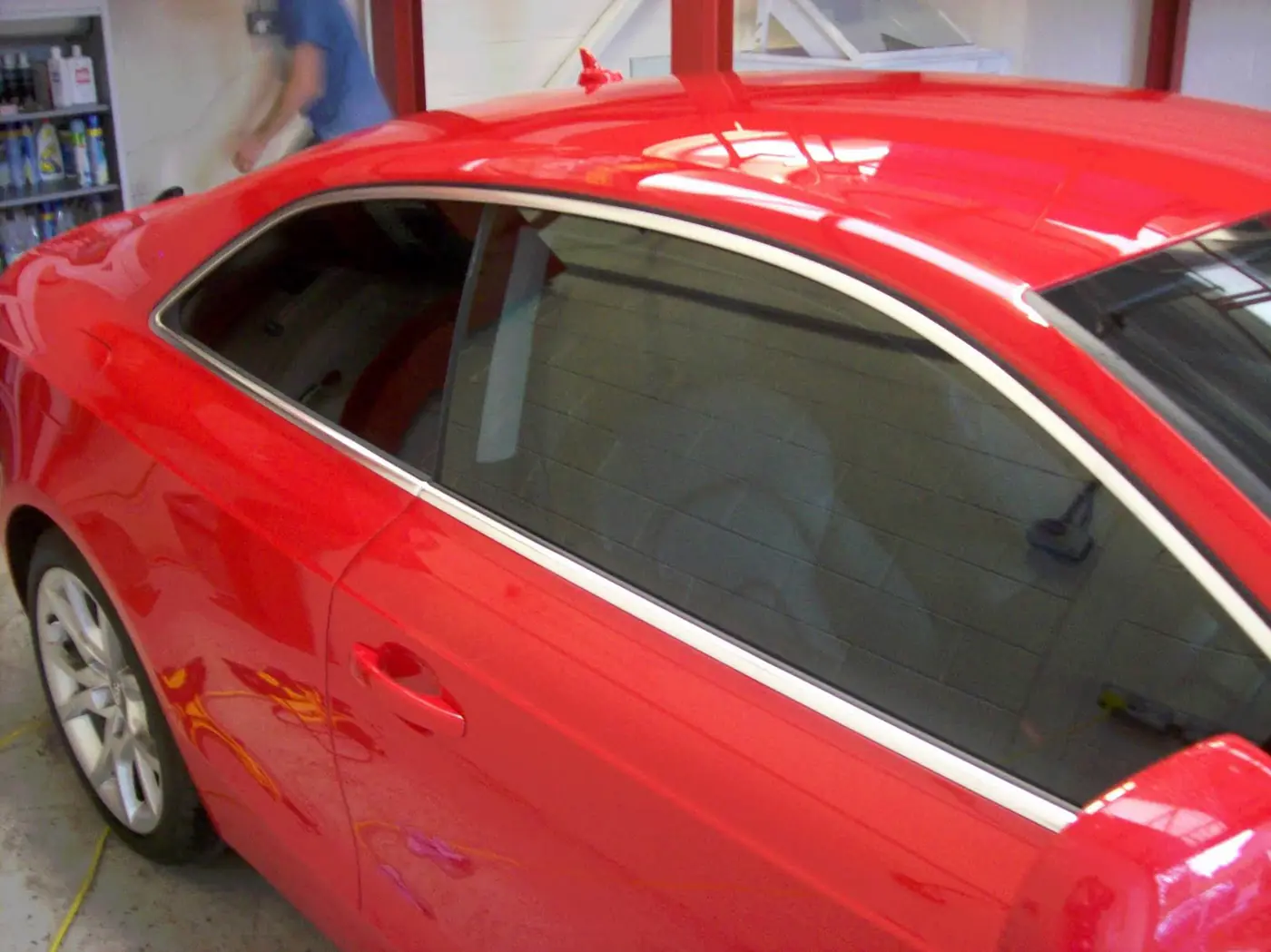 Red coupe with professionally tinted windows
