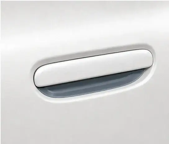 Door Handle Cups paint protection film coverage shown in smoke blue on a white vehicle