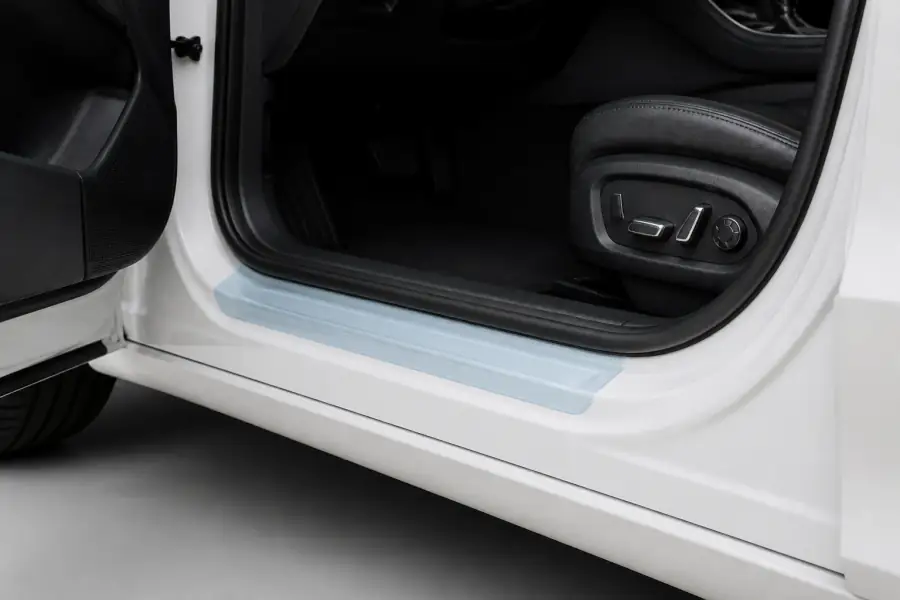 Door Sills paint protection film coverage shown in smoke blue on a white vehicle