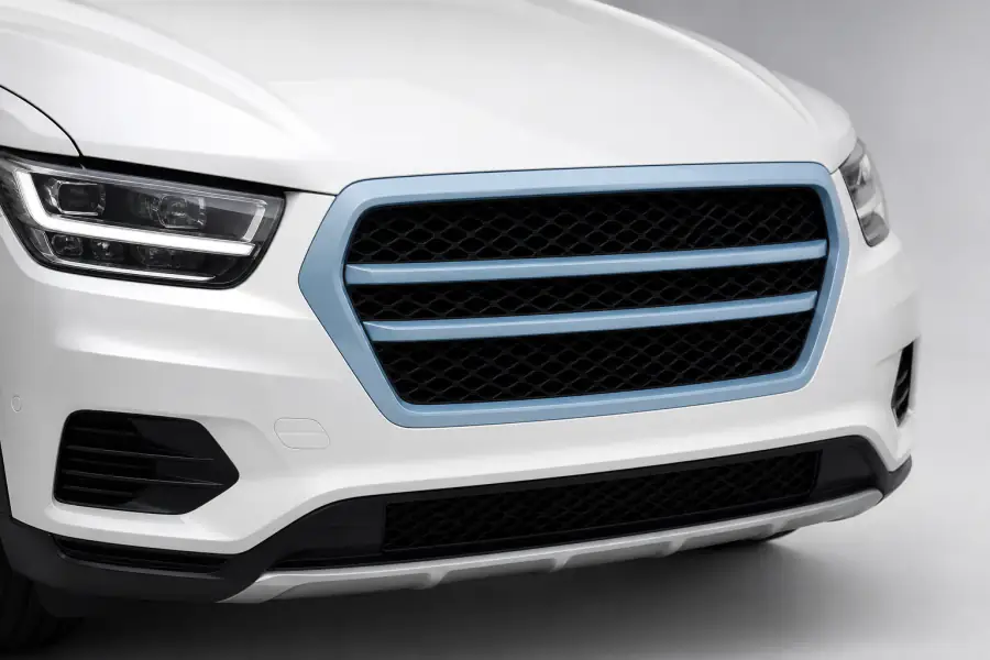 Grille paint protection film coverage shown in smoke blue on a white vehicle