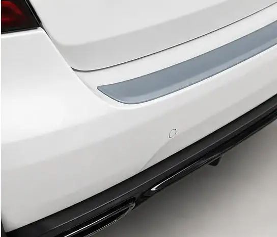 Top of Rear Bumper paint protection film coverage shown in smoke blue on a white vehicle